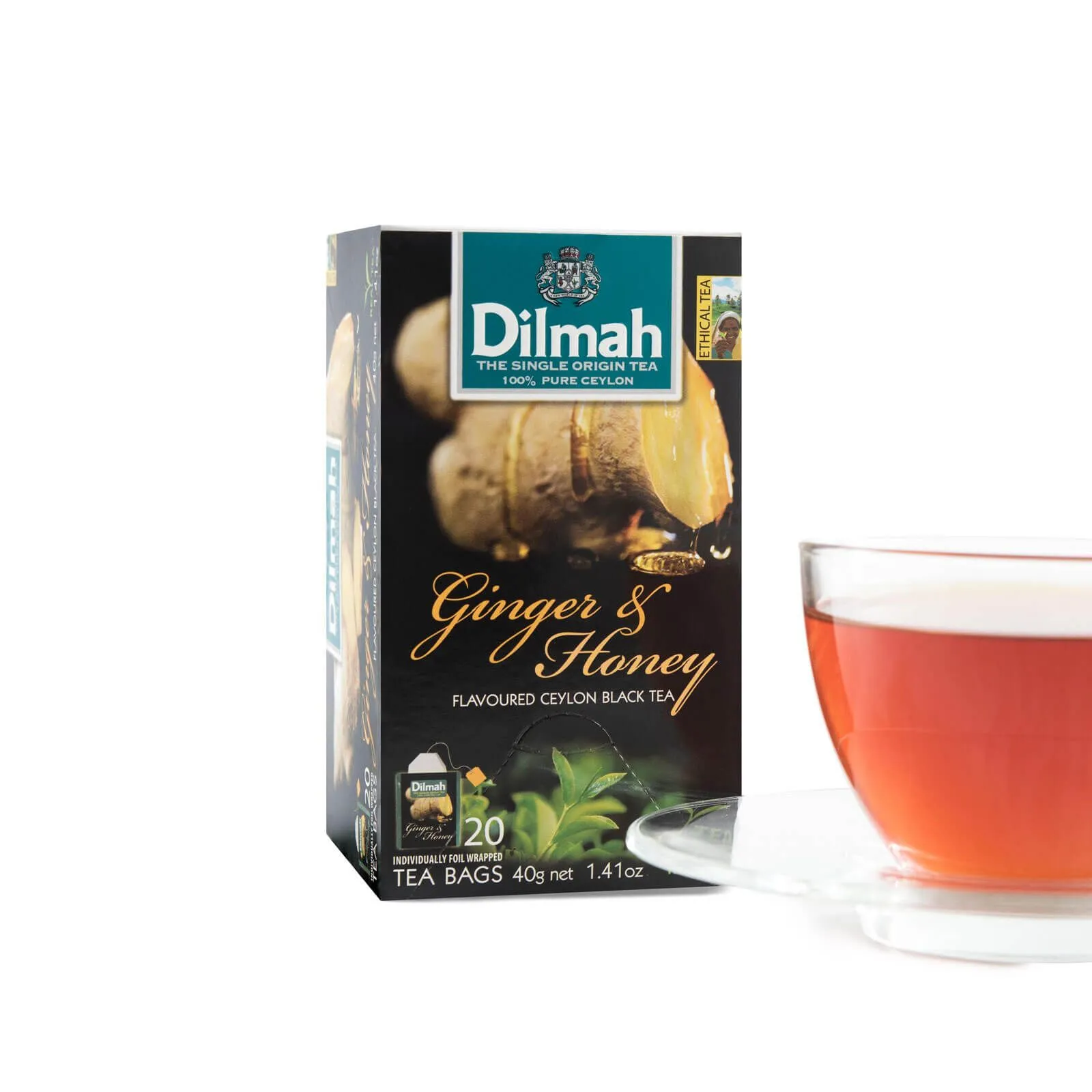 Black carton with a cup of Dilmah Ginger and honey tea