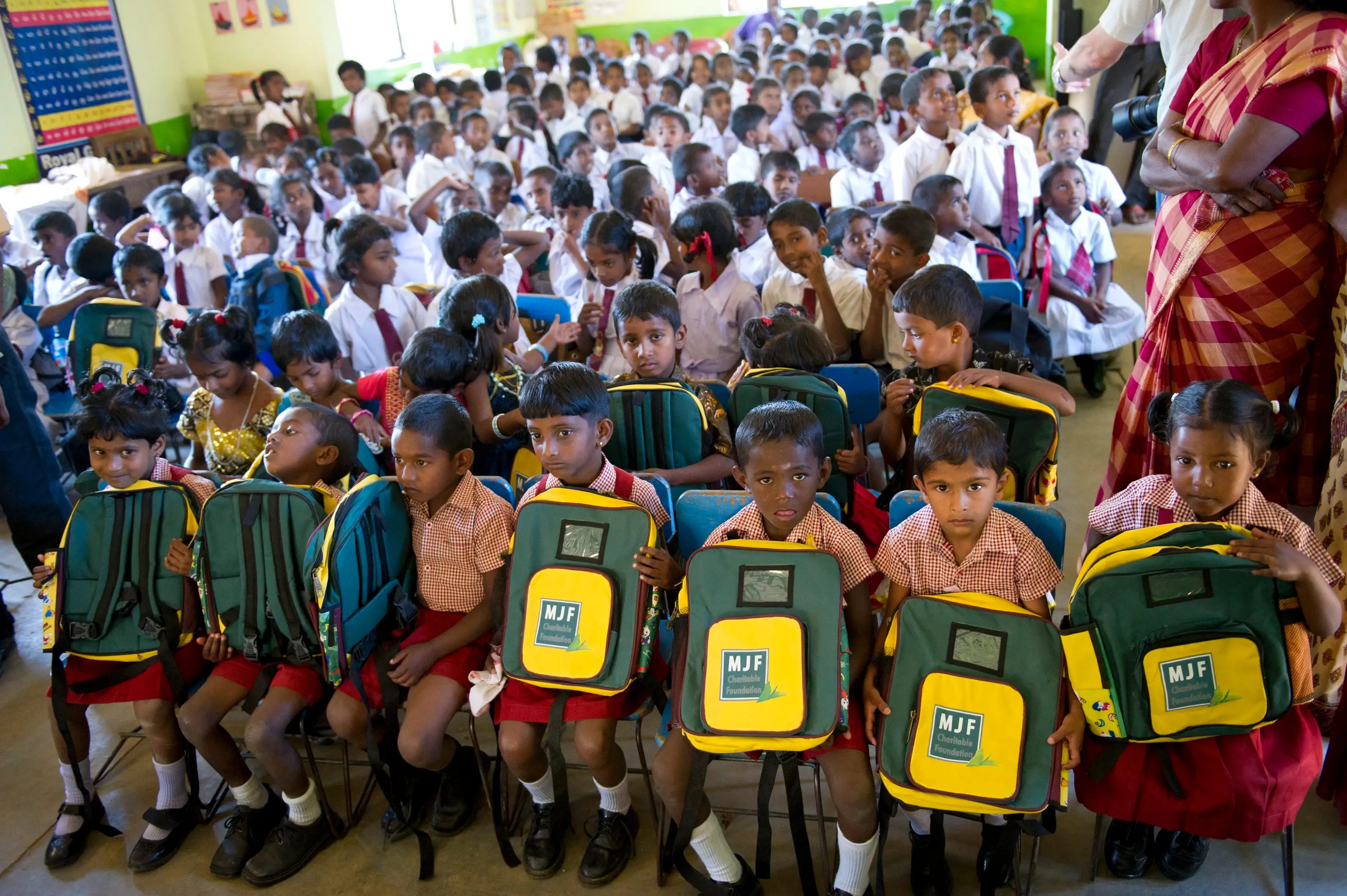 Children at MJF Child Development Centre receive a backpack for the new school year