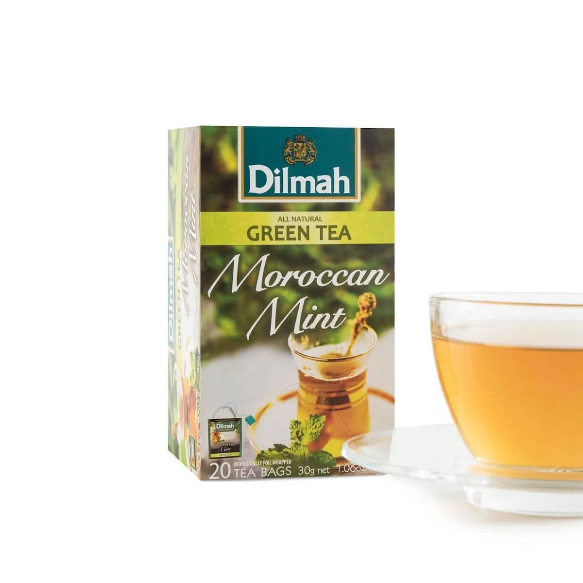 Pack of Moroccan Mint green tea with a cup of this tea